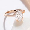 Unique, large 2ct lab diamond oval solitaire ring with claws that look like three bird talons, set in rose gold