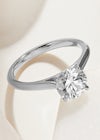 Round diamond solitaire engagement ring with round diamond