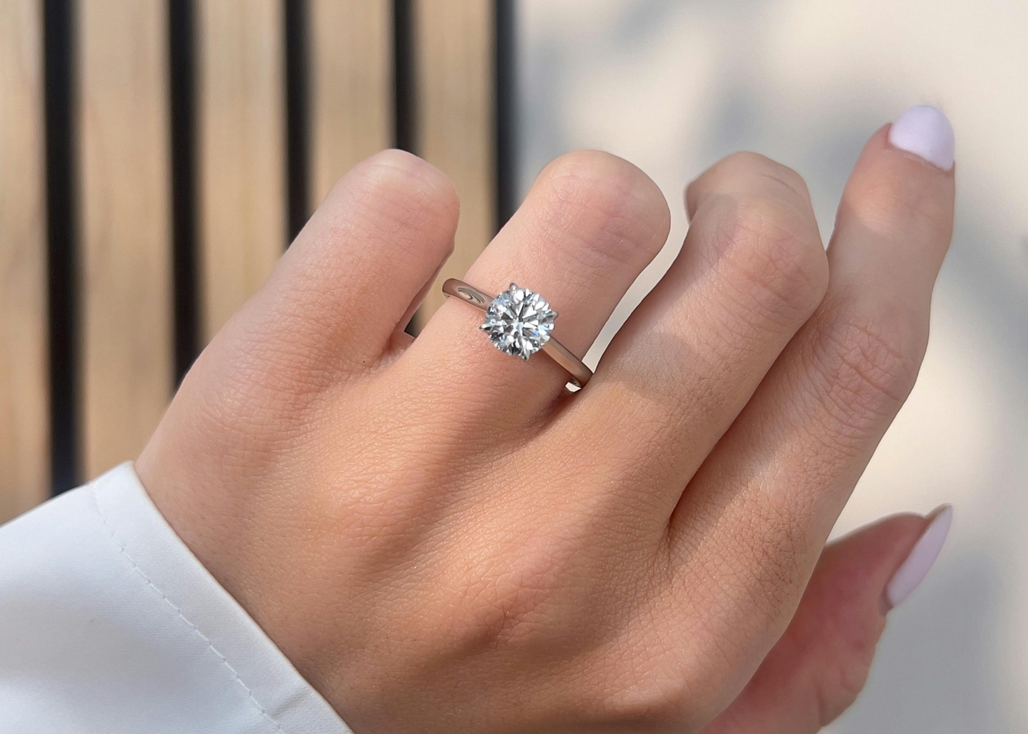 Round Cut Diamond Bardot Solitaire Engagement Ring in Platinum.