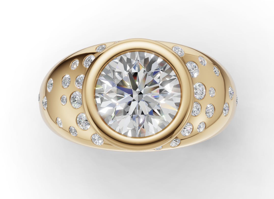 Dua Lipa's chunky gold band engagement ring with added starburst diamonds on the ring's shoulders.