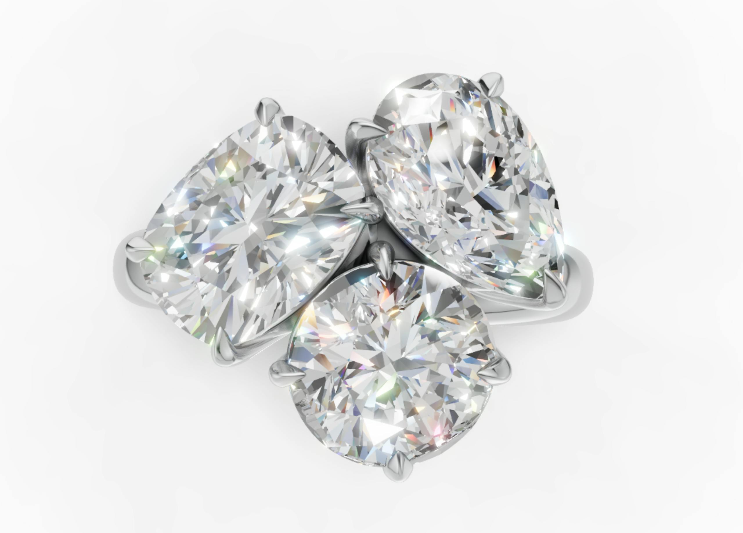 Render prediction of Kylie Jenner's engagement ring with three different shaped diamonds.