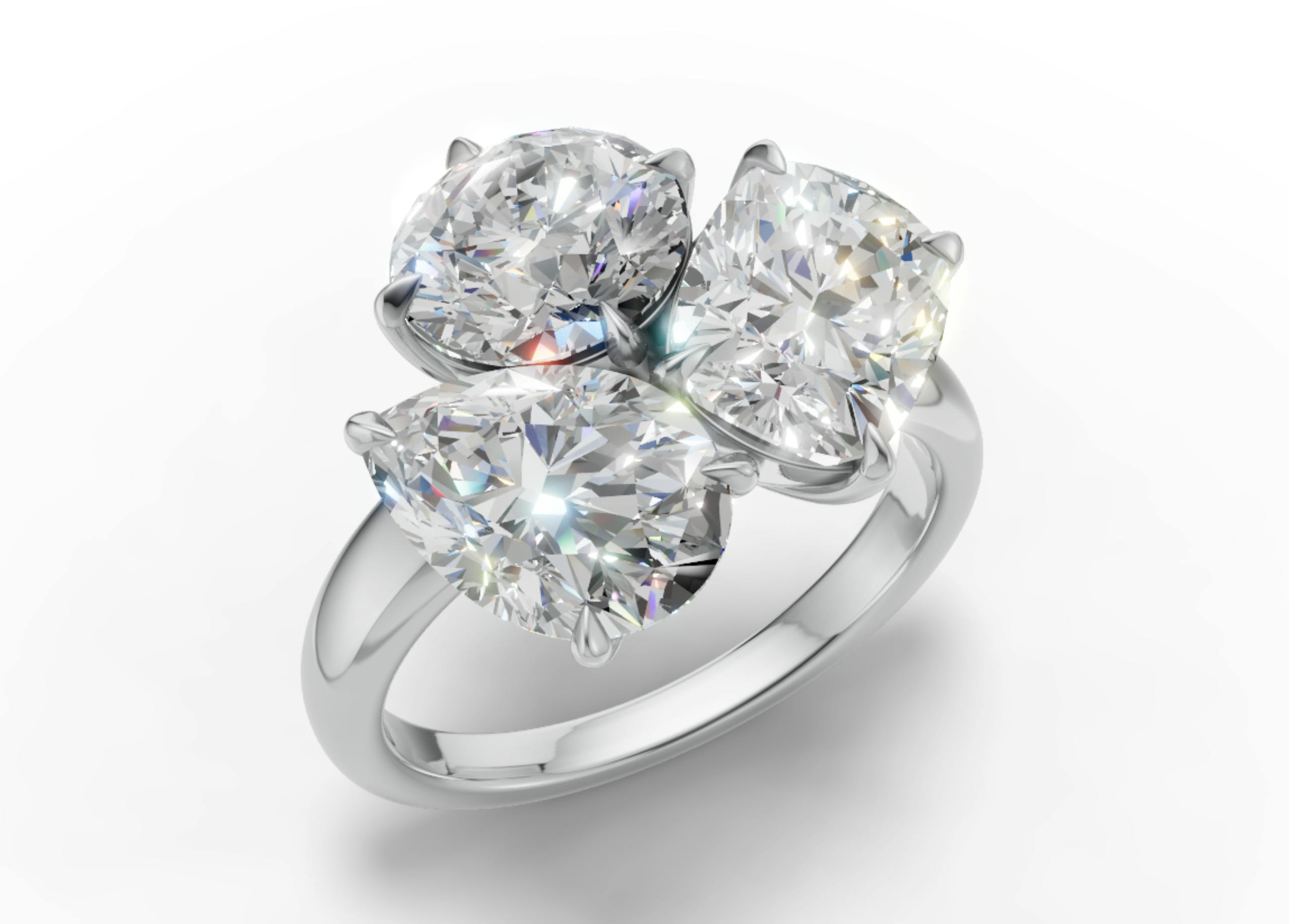 Render prediction side view of Kylie Jenner's engagement ring with three different shaped diamonds.