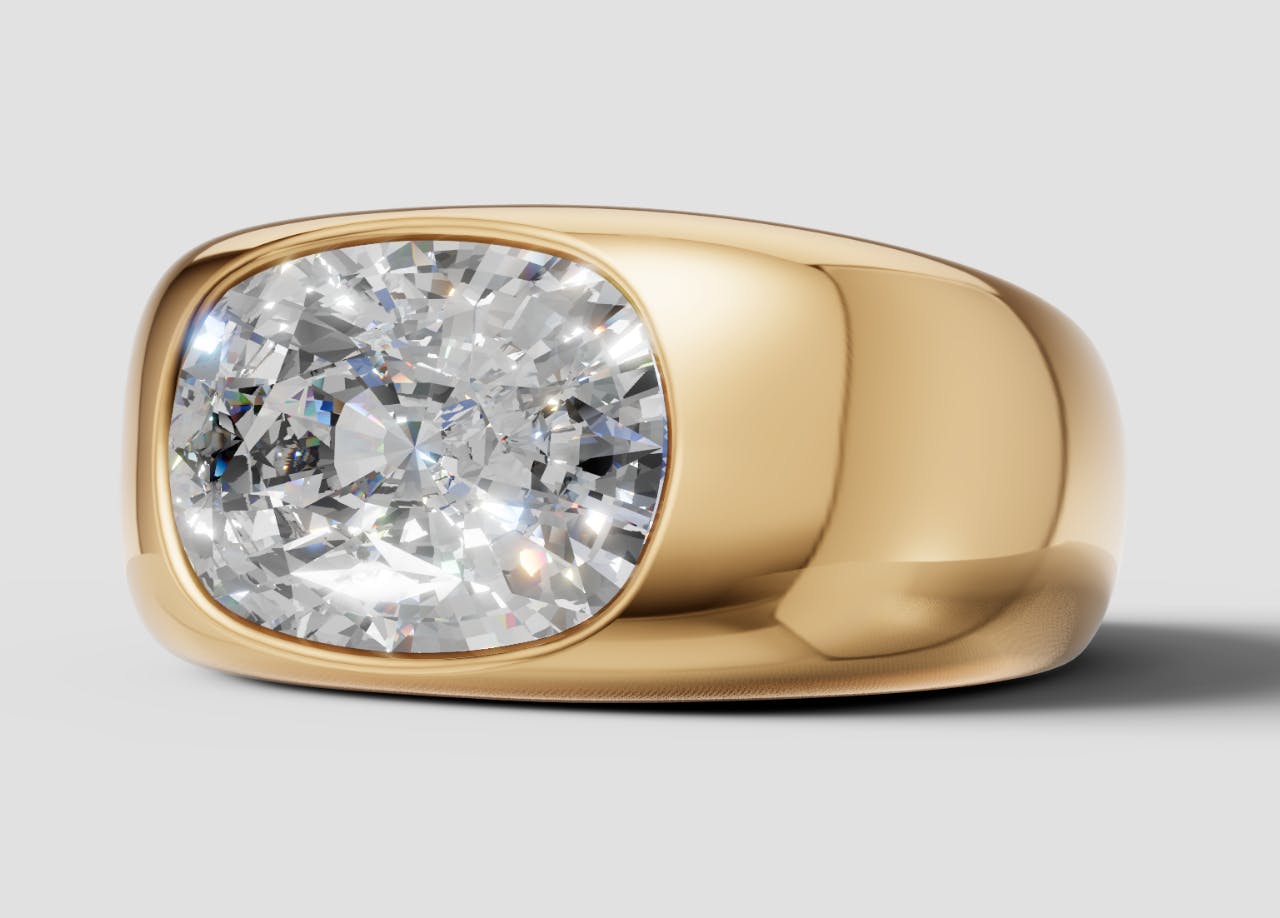 Side angled Queensmith render of Miley Cyrus's engagement ring with an elongated cushion cut diamond, set east-to-west on a chunky yellow gold bezel band.