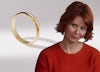 Miranda hobbes and plain yellow gold wedding band.