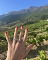 Real Queensmith client shows Round Trilogy Hendricks engagement ring in South Africa.