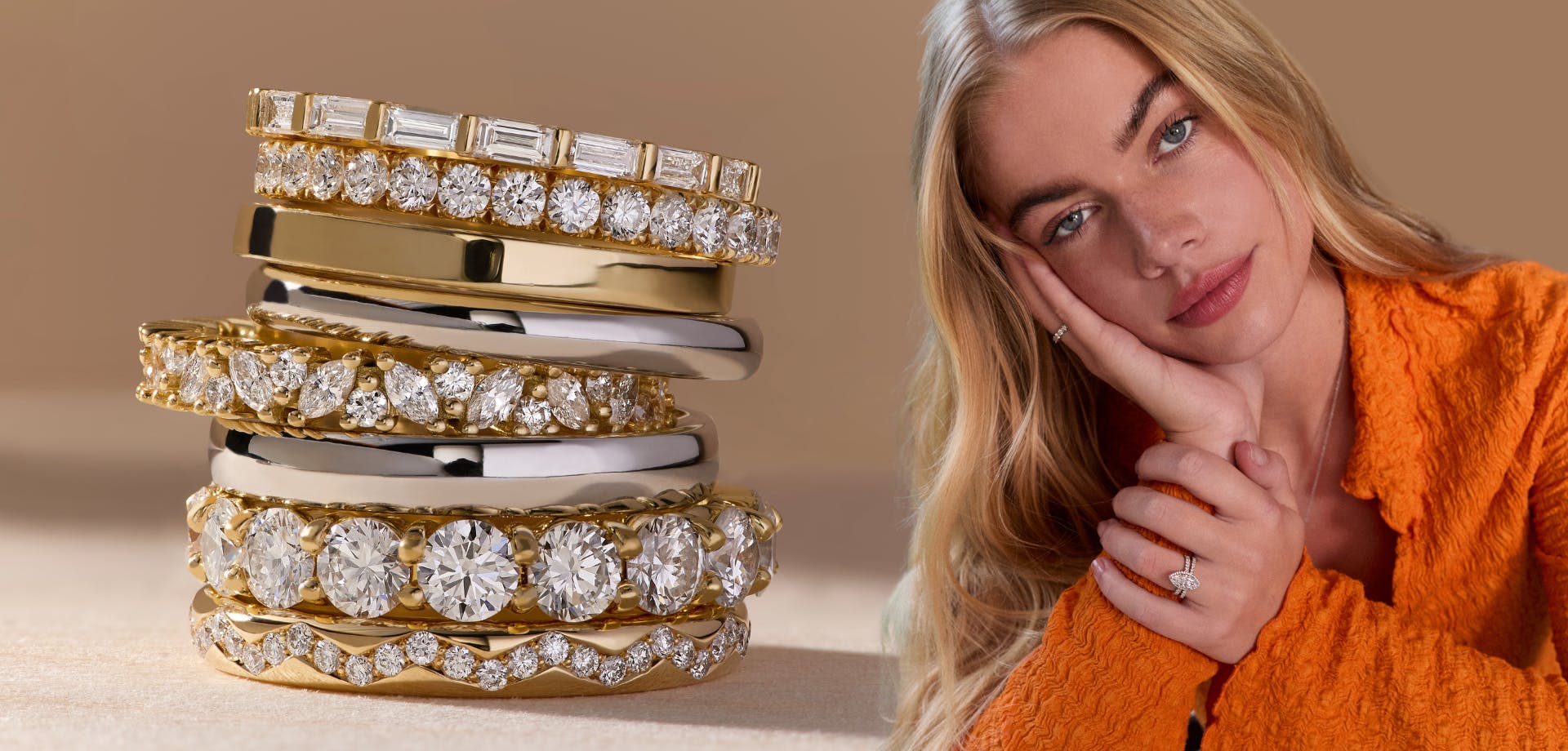 Mixed metal ring stack with yellow gold diamond eternity bands and polished platinum and yellow gold wedding bands.