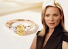 Samantha Jones and trilogy engagement ring with yellow oval centre diamonds and flanked by two pear shaped white diamonds.