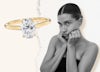 Hailey Bieber's oval diamond solitaire engagement ring in yellow gold.